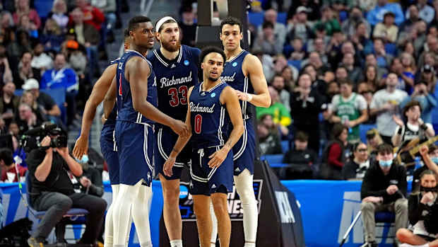 Mar 19, 2022; Buffalo, NY, USA; Richmond Spiders guard Jacob Gilyard (0) reacts in a team huddle during the second half against the Providence Friars during the second round of the 2022 NCAA Tournament at KeyBank Center. Mandatory Credit: Gregory Fisher-USA TODAY Sports